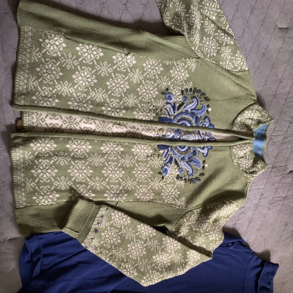 2 piece embroidered Icelandic cardigan and underneath turtleneck